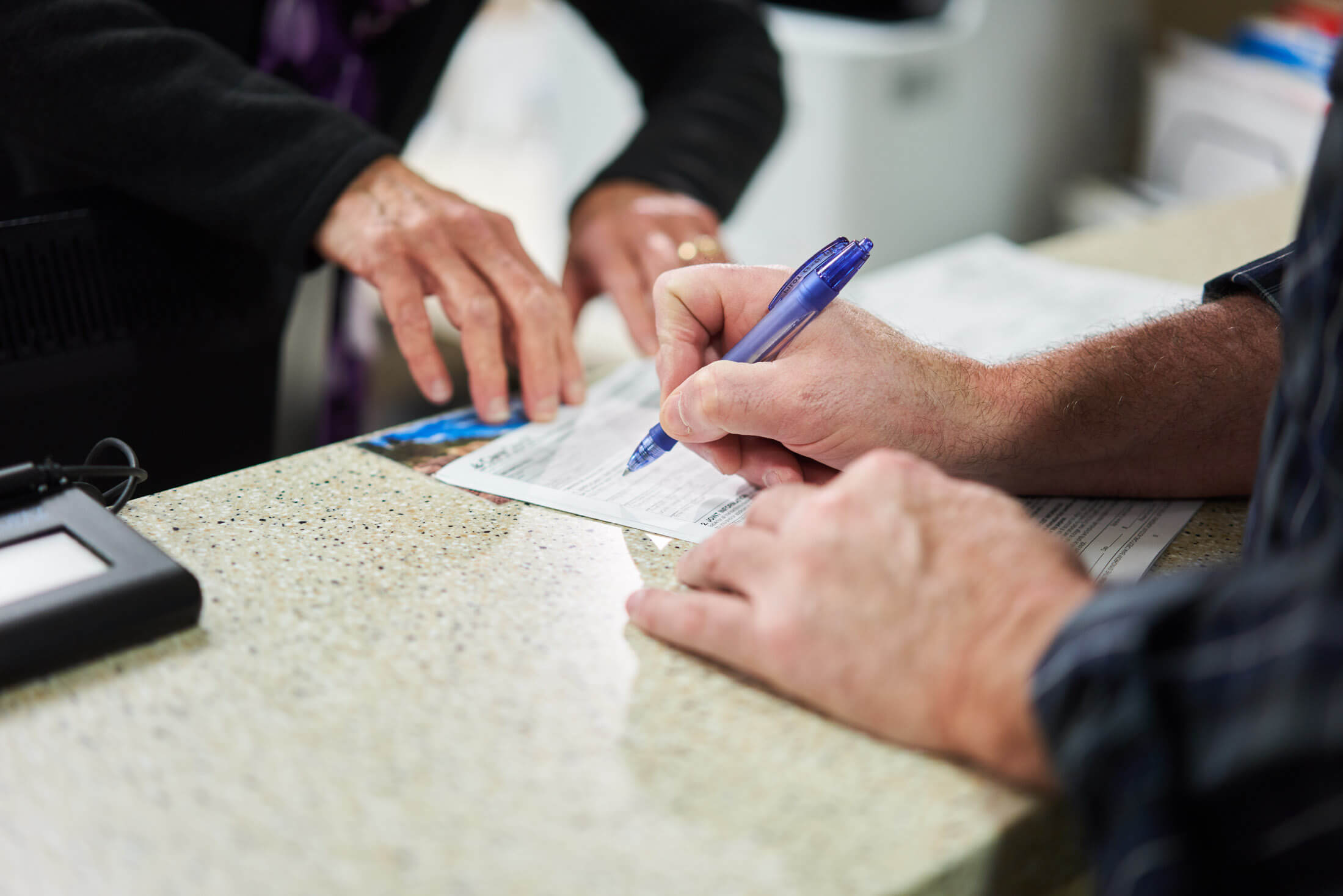 Pleasant Street Dental, Patient filling out paperwork
